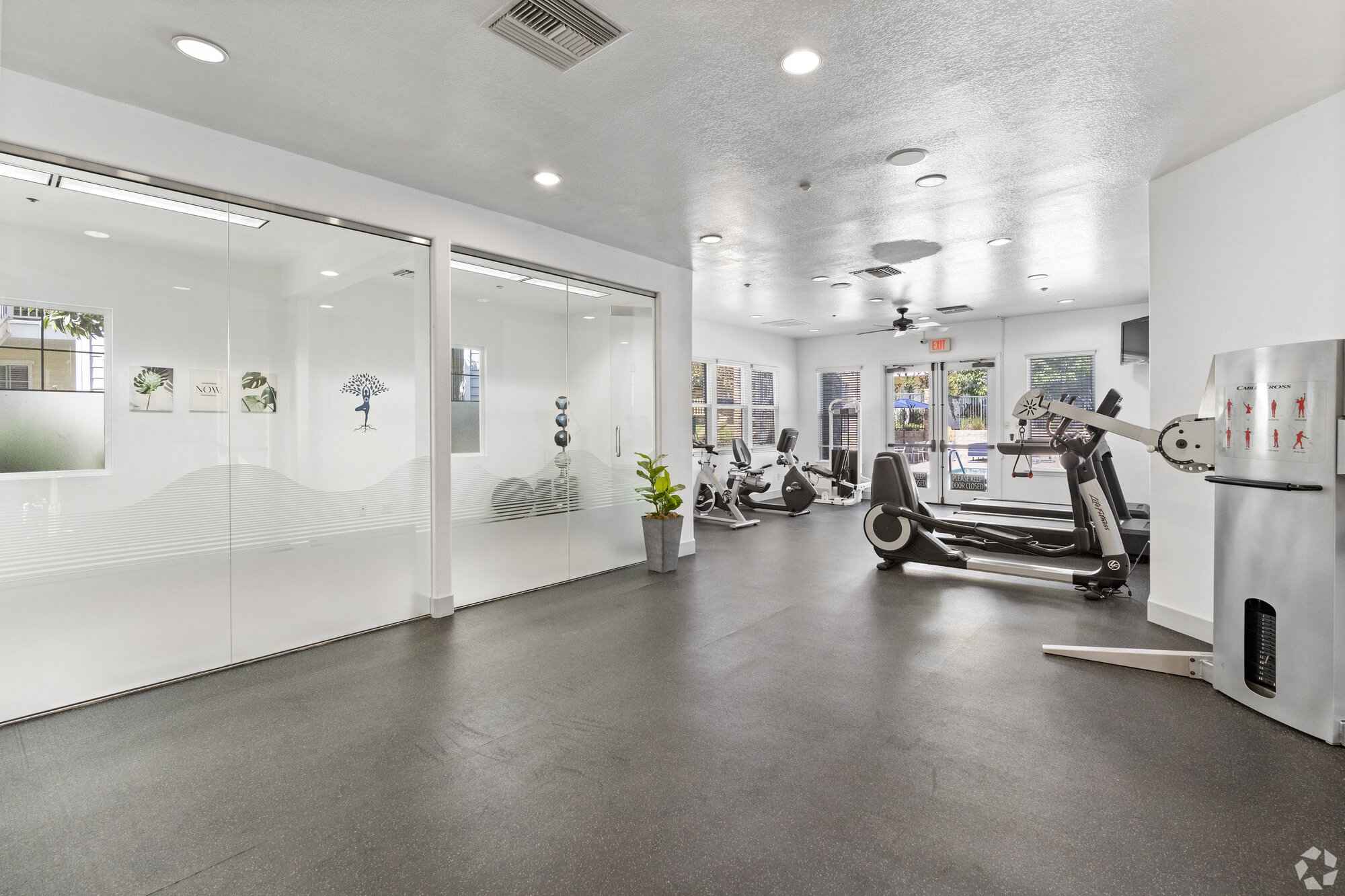 modern fitness center with cardio equipment at Via Ventura